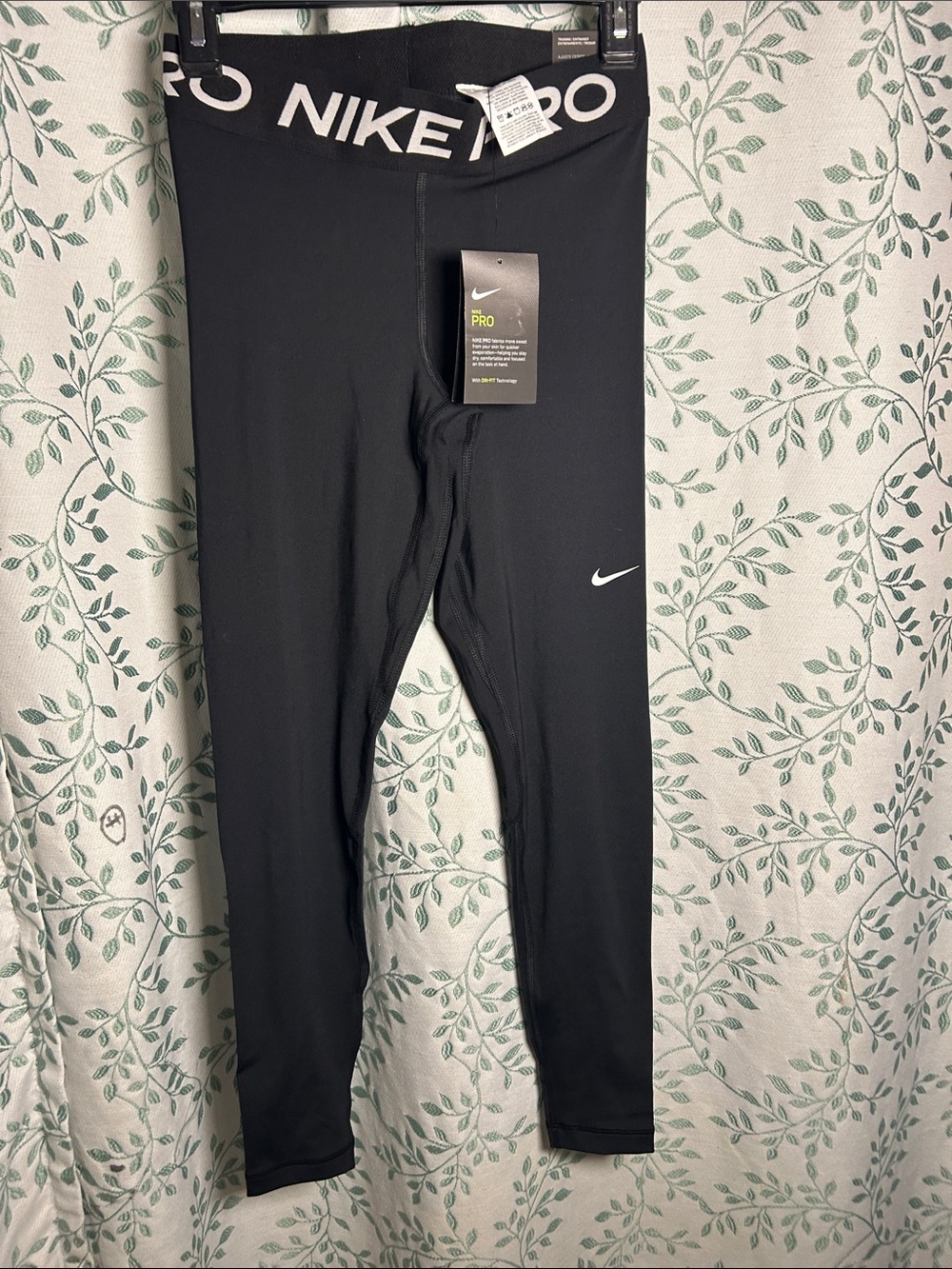 Nike Kids Black Performance Leggings with White Swoosh